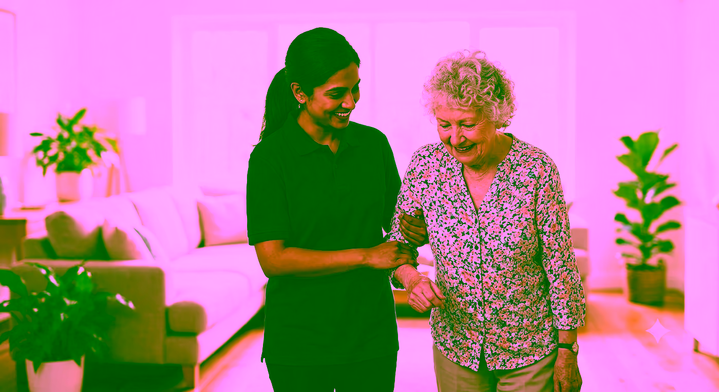 A Dendera Care carer helping an older woman walk safely at home